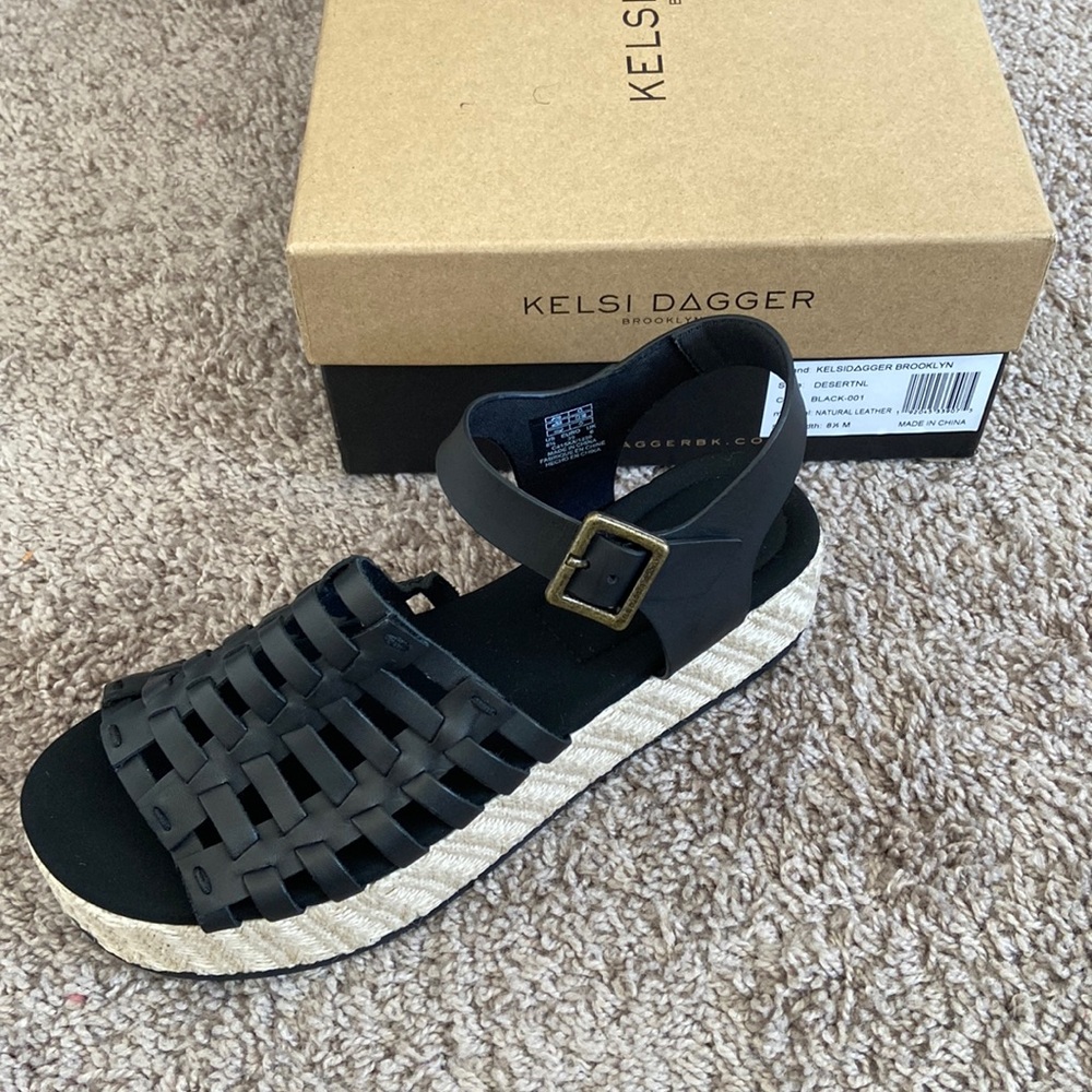 Black leather sandals. New in box.